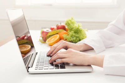 female-nutritionist-working-laptop-female-nutritionist-working-laptop-office-close-up-hands-woman-dietitian-typing-126314239